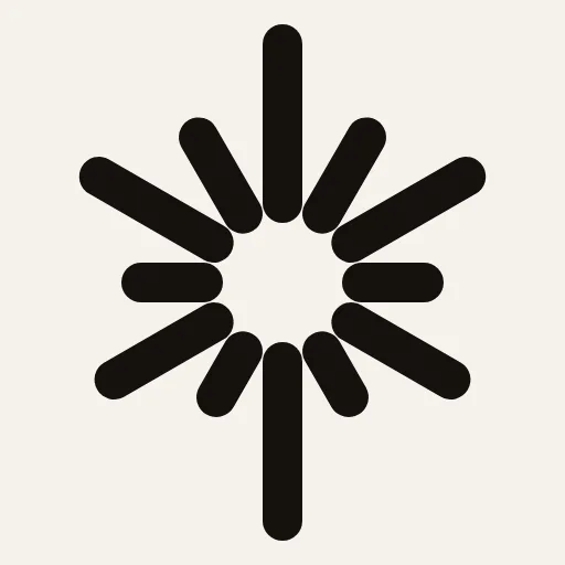 The mark alone. Below 24px it drops to six rays, because the full burst turns to mush.